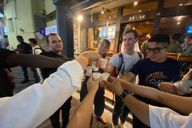 3Hour Osaka Pub Crawl Bar Hopping Nightlife Guided Tour in Namba - Stop 2: Kanemasa Liquor Store and Local Okonomiyaki-Style Eating