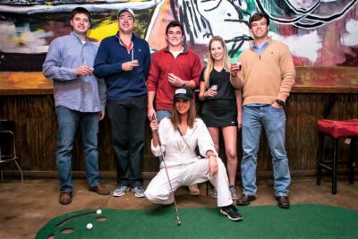 Nashville Pub Crawl Golf Game by Golf Cart - Stop 1 at Joyride Nashville: putting green + caddie energy