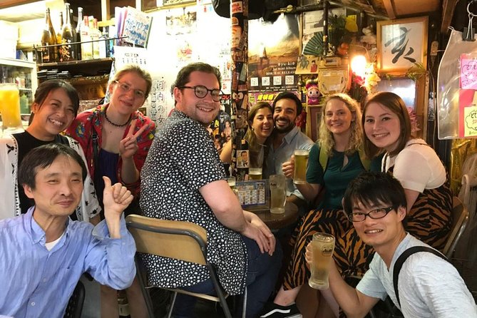 Osaka Bar Hopping Night Walking Tour in Namba (3 bars, 6 tastes) - The Ezaki Glico sign area: a famous marker that makes the night feel real