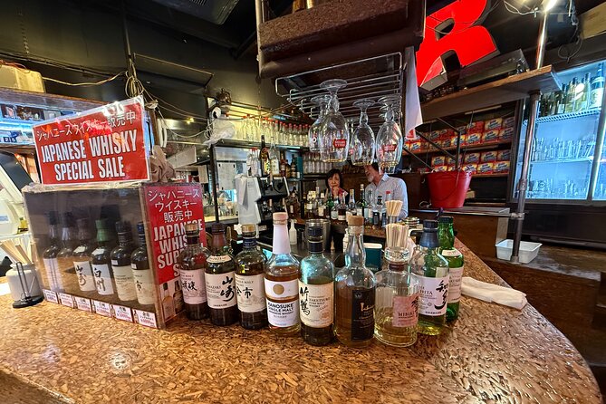 Samurai Guide Sho’s:Kichijoji Night Training–Drink & Dish Pairing - Stop 1 and the Harmonica Yokocho vibe: reserved seating and a first kanpai
