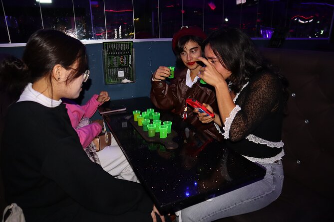 Saturday Night Pub Crawl for Professionals in Vienna, Austria - Daiquiri Shotothek: glow atmosphere and the free shot deal