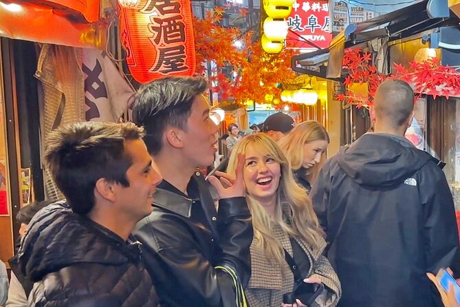 Tokyo: Shinjuku Bar Hopping & Night Walking Tour - Stop 2: Omoide Yokocho and the rhythm-shift between izakaya styles