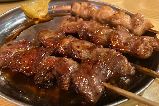 Tokyo Shinjuku Japanese Local Bar Hopping and Food Tour - Shinjuku Golden Gai: Tiny Bars, Old-Style Atmosphere